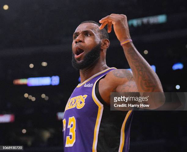 LeBron James of the Los Angeles Lakers celebrates his three pointer during a 121-113 win over the San Antonio Spurs at Staples Center on December 5,...