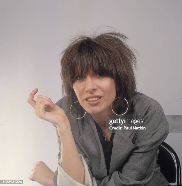 Portrait of American musician Chrissie Hynde, of the group Pretenders, as she poses at the UIC Pavillion, Chicago, Illinois, May 24, 1982.