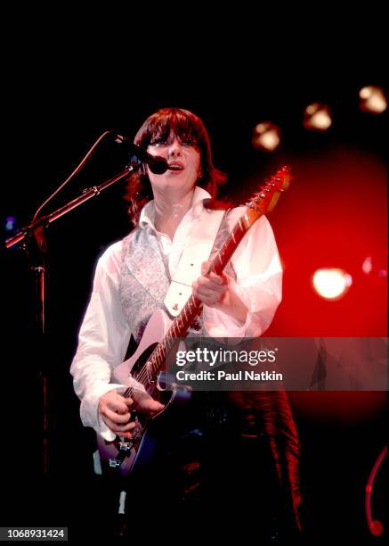American musician Chrissie Hynde, of the group Pretenders, plays guitar as she performs at the Aragon Ballroom, Chicago, Illinois, April 13, 1984.