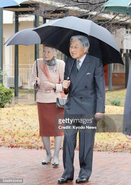 Japanese Emperor Akihito and Empress Michiko visit a welfare facility set up for people with learning disabilities in Tokyo's Kunitachi city on Dec....