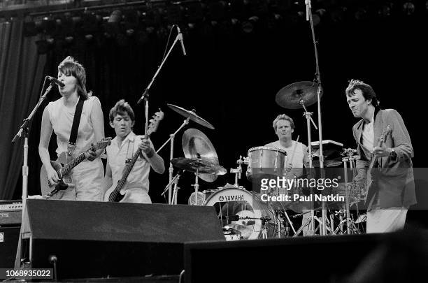 British-American rock group Pretenders perform onstage at the US Festival, Ontario, California, May 30, 1983. Pictured are, from left, Chrissie...