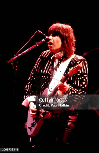 American musician Chrissie Hynde, of the group Pretenders, plays guitar as she performs at the Poplar Creek Music Theater in Hoffman Estates,...