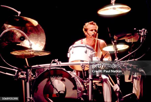 British musician Martin Chambers, of the group Pretenders, plays drums as he performs at the Poplar Creek Music Theater in Hoffman Estates, Illinois,...