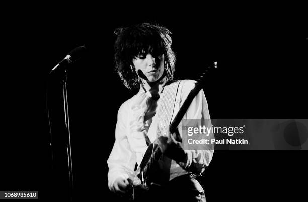 American musician Chrissie Hynde, of the group Pretenders, plays guitar as she performs at the Aragon Ballroom in Chicago, Illinois, August 22, 1981.