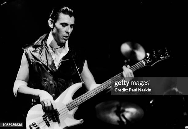 British musician Pete Farndon , of the group Pretenders, plays bass guitar as he performs at the Aragon Ballroom in Chicago, Illinois, August 22,...