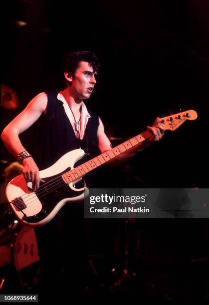 British musician Pete Farndon , of the group Pretenders, plays bass guitar as he performs at the Aragon Ballroom in Chicago, Illinois, August 22,...