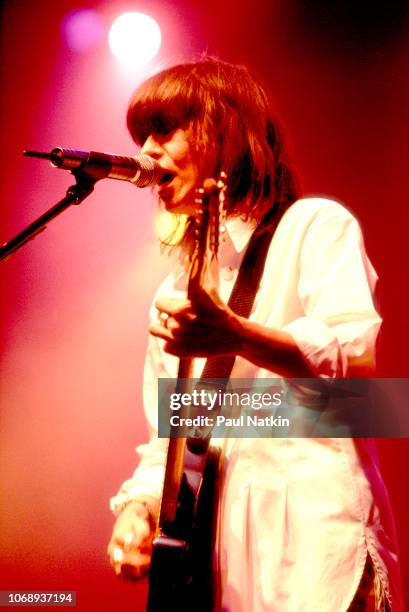 American musician Chrissie Hynde, of the group Pretenders, plays guitar as she performs at the Rosemont Horizon, Rosemont, Illinois, November 1, 1994.