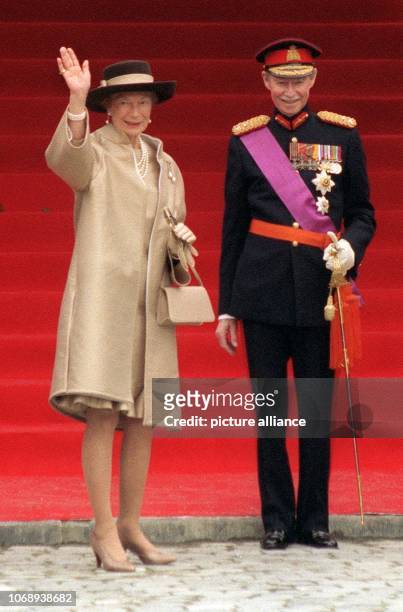Josephine Charlotte of Luxembourg and her husband Grand Duke Jean of Luxembourg arrive at the wedding of the Belgian Crown Prince couple in Brussels,...