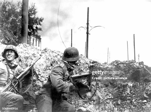 German infantry in street fights for Stalingrad . The battle was the turning point at the Eastern front and marked the first defeat of the German...