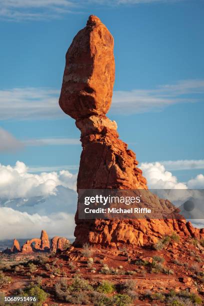 balanced rock and turret arch at sunset in arches national park - balanced rocks stock pictures, royalty-free photos & images