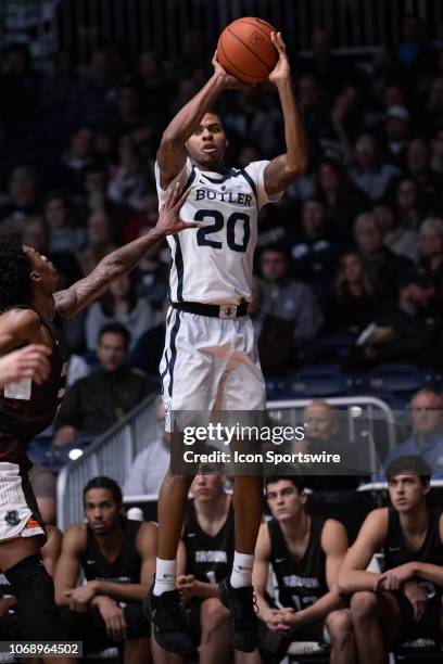 Butler Bulldogs guard Henry Baddley shoots a three pointer during the men's college basketball game between the Butler Bulldogs and Brown Bears on...