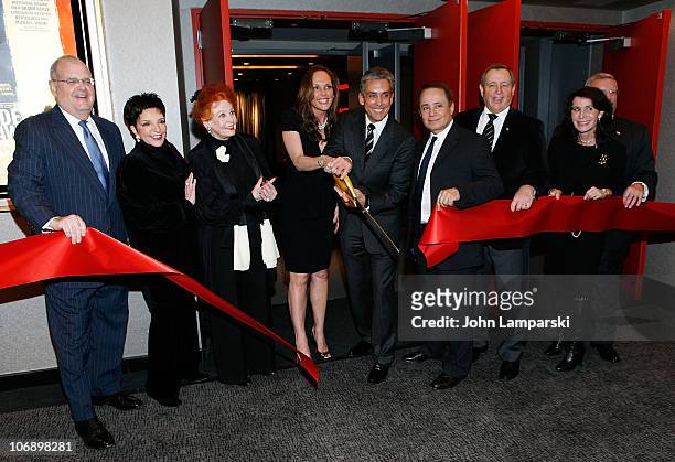 Roger Goldman, Liza Minelli, Arlene Dahl, Clo Cohen, Charles Cohen and Katherine Oliver attend the ribbon cutting ceremony for the grand re-opening...