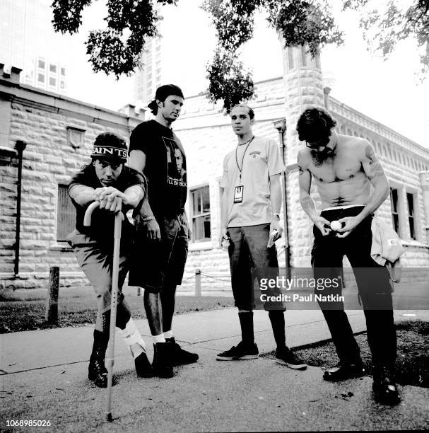 Portrait of the Red Hot Chili Peppers, left to right, Anthony Kiedis, Chad Smith, John Frusciante, and Flea on the street in Chicago, Illinois,...