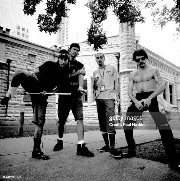 Portrait of the Red Hot Chili Peppers, left to right, Anthony Kiedis, Chad Smith, John Frusciante, and Flea on the street in Chicago, Illinois,...