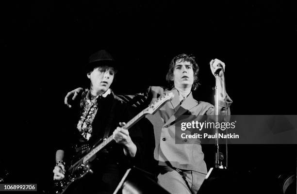 British musician John Ashton, on guitar, and Richard Butler, both of the Psychedelic Furs, perform onstage at the Riviera Theater, Chicago, Illinois,...