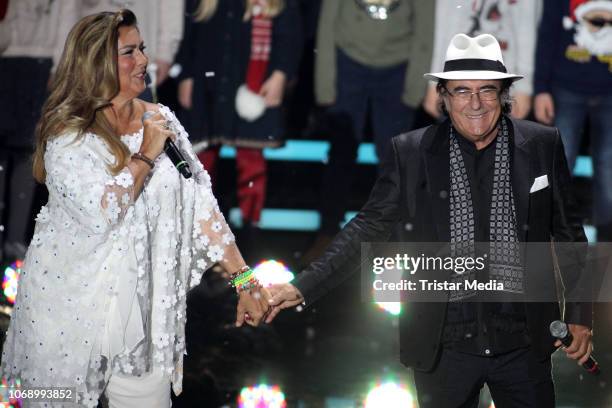 Al Bano and Romina Power perform during the charity tv show 'Die schoensten Weihnachts-Hits' in favor of MISEREOR and Brot fuer die Welt on December...