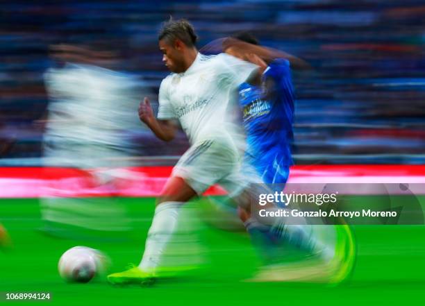 Mariano Diaz of Real Madrid runs with the ball during the Copa del Rey fourth round match between Real Madrid and Melilla at Estadio Bernabeu on...
