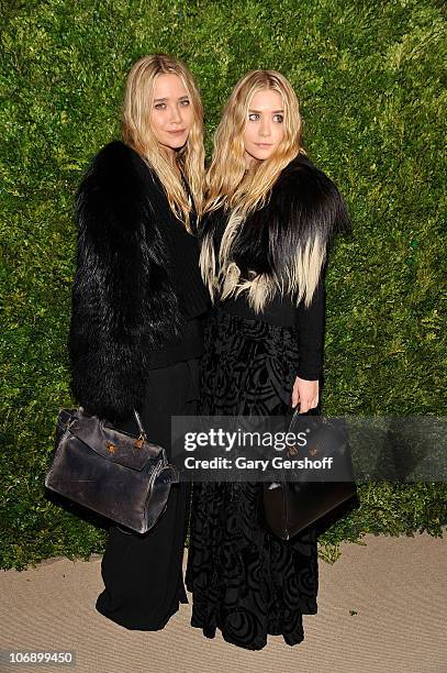 Ashley Olsen and Mary-Kate Olsen attend the 7th Annual CFDA/Vogue Fashion Fund Awards at Skylight SOHO on November 15, 2010 in New York City.