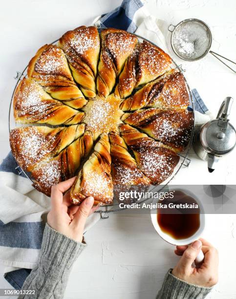 freshly baked cinnamon sweet brioche. - christmas dessert stock pictures, royalty-free photos & images