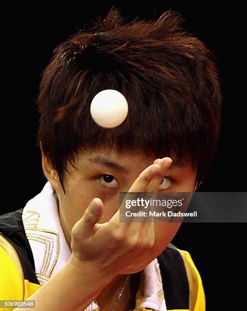 Guo Yue of China serves in her Women's Team Gold Medal Contest against Li Jiawei of Singapore at Guangzhou Gymnasium during day four of the 16th...