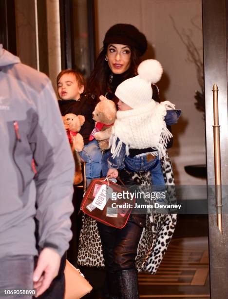 Amal Clooney seen with her children Alexander Clooney and Ella Clooney on December 6, 2018 in New York City.