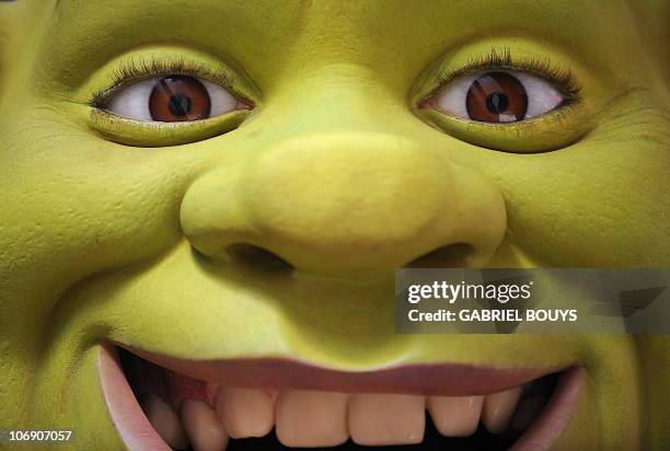 Shrek poses after being honored by a Star on the Hollywood Walk of Fame in Hollywood, California on May 20, 2010. AFP PHOTO / GABRIEL BOUYS