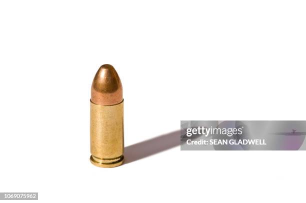 9 mm bullet - cartridge stock pictures, royalty-free photos & images