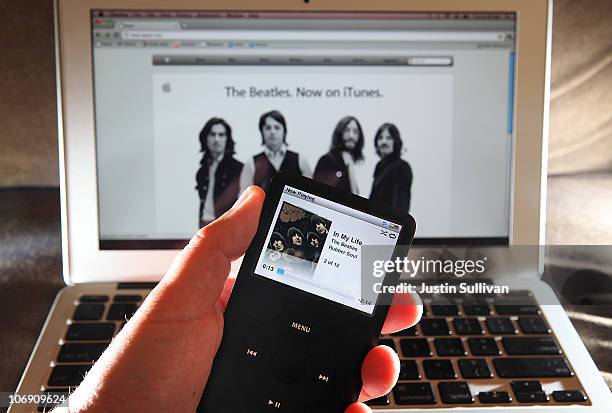 Beatles song plays on an iPod November 16, 2010 in San Anselmo, California. Apple has struck a deal with the record label EMI and the Beatles'...