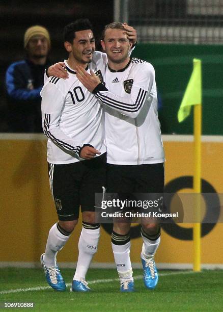 Konstantin Rausch of Germany celebrates the first goal with Ilkay Guendogan of Germany during the U21 international friendly match between Germany...