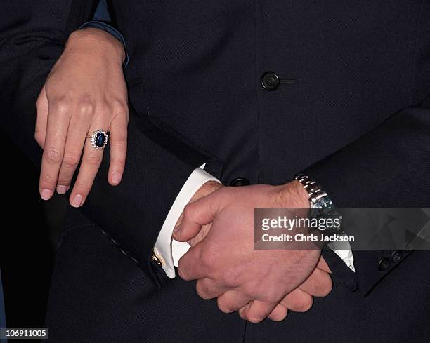 Close up of Prince William's watch and Kate Middleton's engagement ring as they pose for photographs in the State Apartments of St James Palace on...