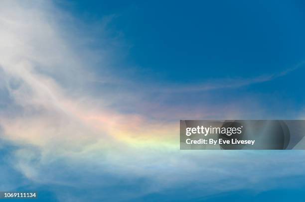 sky iridescence - rainbow clouds stock pictures, royalty-free photos & images