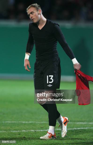 Jason Steele of England walks off the pitch after a red card during the U21 international friendly match between Germany and England at the Brita...