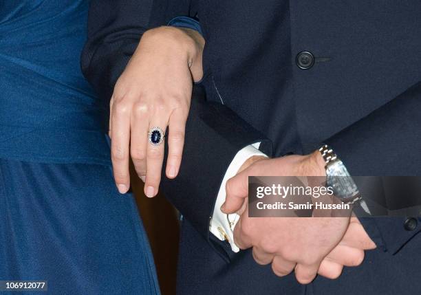 Close up of Prince William's watch and Kate Middleton's engagement ring as they pose for photographs in the State Apartments of St James Palace on...