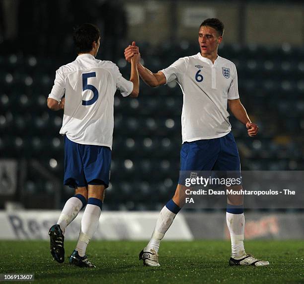 George Taff of England celebrates with team mate Tom Thorpe after he scores the first goal of the game during the International friendly match...