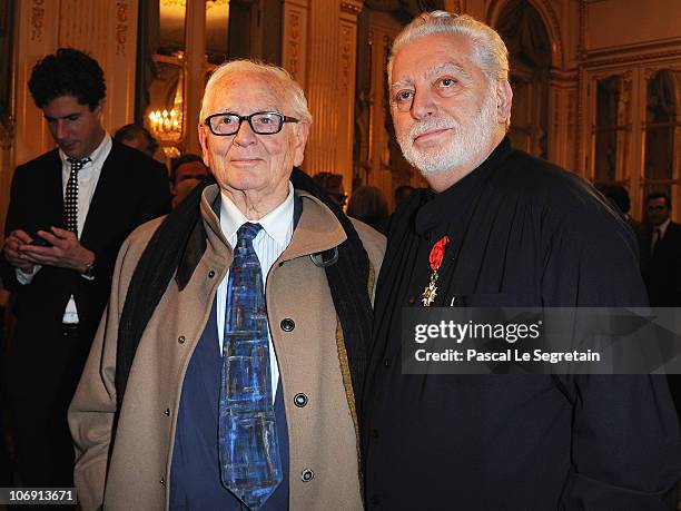 Fashion designer Pierre Cardin poses with Paco Rabanne after he received the Legion of Honor at Ministere de la Culture on November 16, 2010 in...