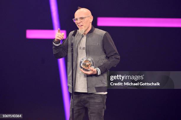 Best Single' award winner Thomas D of Die Fanstatischen Vier speaks on stage at the 1Live Krone radio award at Jahrhunderthalle on December 6, 2018...