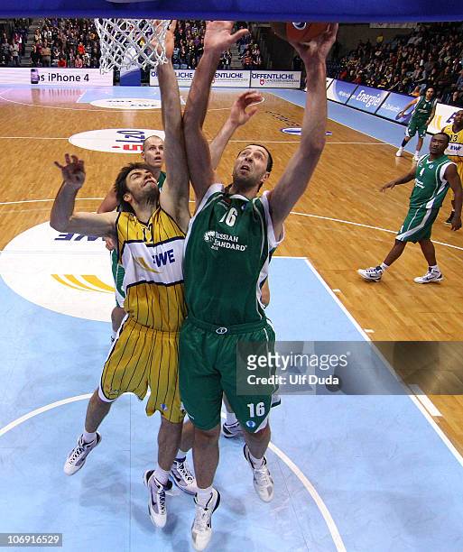 Hasan Rizvic, #16 of Unics Kazan in action with Oliver Stevic, #17 of EWE Baskets Oldenburg during the Eurocup Basketball Date 1 game between Ewe...