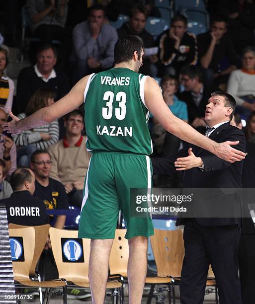 Evgeny Pashutin, Headcoach of Unics Kazan in action with Slavko Vranes, #33 of Unics Kazan during the Eurocup Basketball Date 1 game between Ewe...