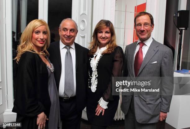 Joy Canfield, Sir Philip Green, Karren Brady and Richard Desmond attends the 'How To Feed A Man' book launch party for at Il Bottaccio on November...