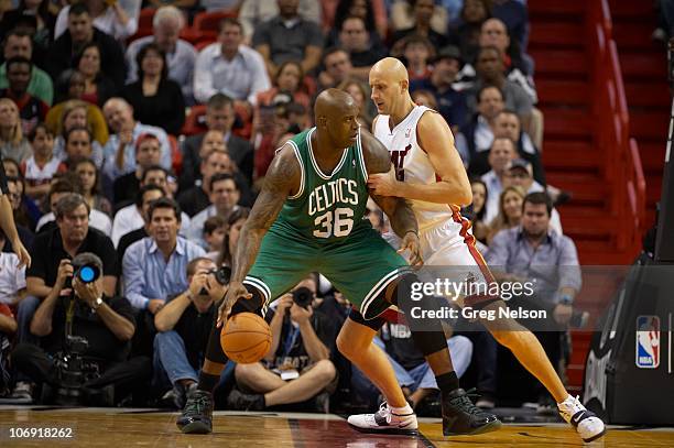 Boston Celtics Shaquille O'Neal in action vs Miami Heat Zydrunas Ilgauskas at American Airlines Arena. Miami, FL CREDIT: Greg Nelson