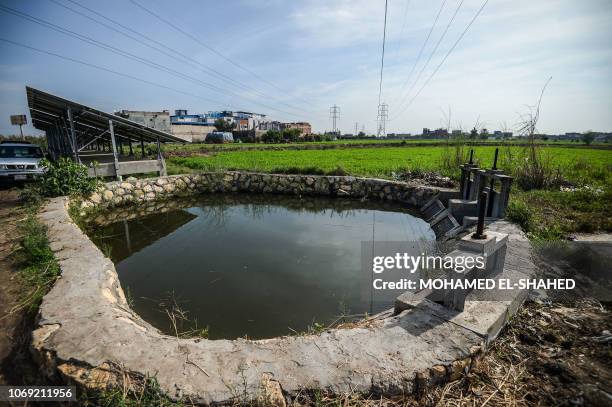 Picture shows a water basin used for field watering in Kafr al-Dawar village in northern Egypt's Nile Delta, on November 26, 2018. The country's...