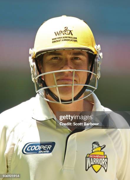 Marcus North of the Warriors walks back to the pavilion at the lunch break not out during day one of the Sheffield Shield match between the Victorian...