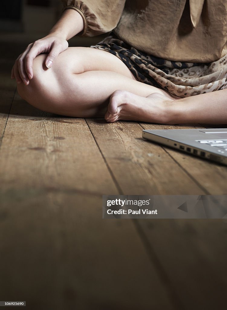 Cropped shot young woman in lotus position