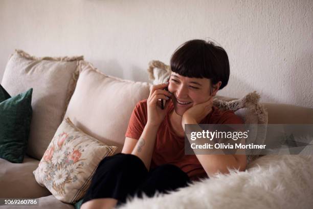 woman talking on the phone - showus phone stock pictures, royalty-free photos & images