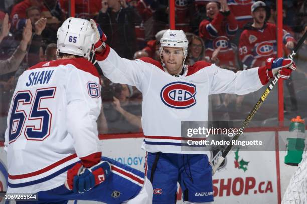 Andrew Shaw of the Montreal Canadiens celebrates his second period goal against the Ottawa Senators with teammate Jonathan Drouin at Canadian Tire...