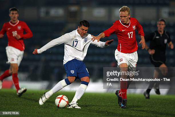 George Moncur of England in action during the International friendly match between England U18 and Poland U18 at Adams Park on November 16, 2010 in...