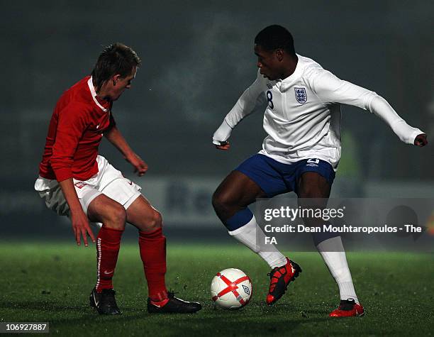 Chuks Aneke of England beats a Poland defender during the International friendly match between England U18 and Poland U18 at Adams Park on November...