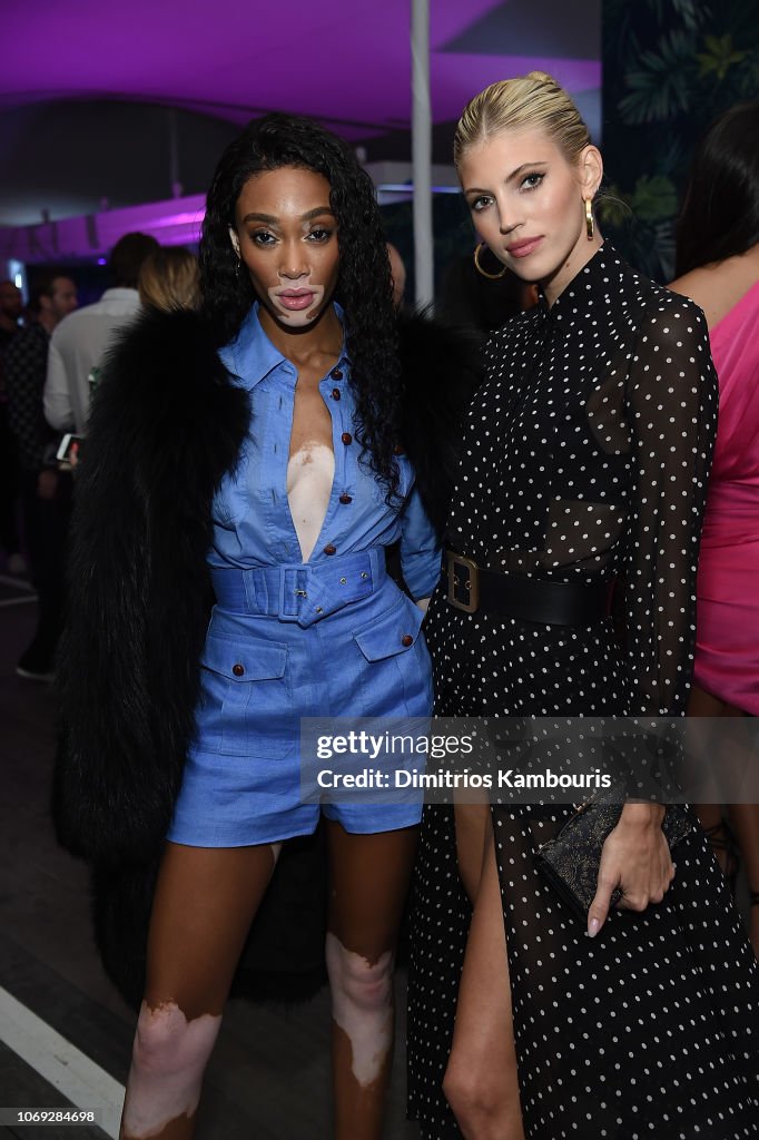 Winnie Harlow and Devon Windsor attend Vladimir Restoin Roitfeld And