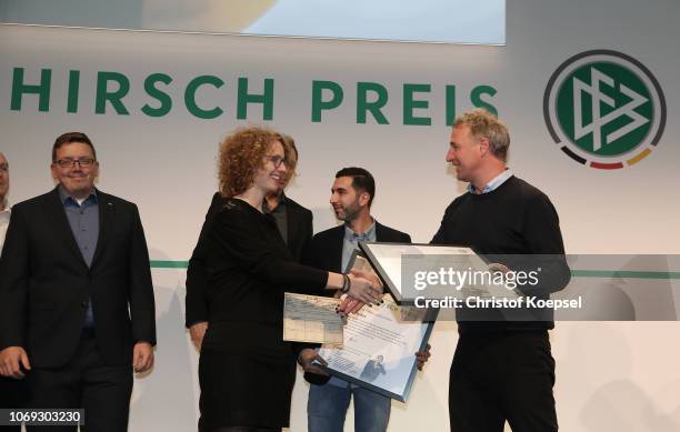 Marco Bode, former player of Werder Bremen hands out the second prize of the Julius Hirsch Preis to the fan project of Hertha BSC Berlin and fan...