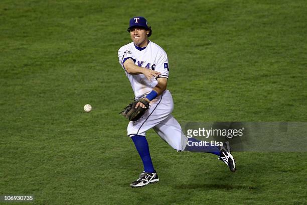 Ian Kinsler of the Texas Rangers throws the ball to first base against the San Francisco Giants in Game Five of the 2010 MLB World Series at Rangers...